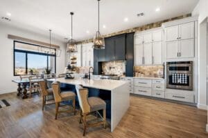 Chef's kitchen with large island and custom cabinetry in Queen Creek Arizona