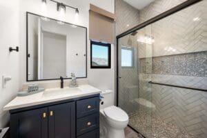 Custom home bathroom with frameless glass shower and contemporary design Queen Creek AZ