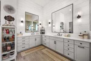 Luxury master bathroom with dual vanities and modern lighting in Queen Creek Arizona