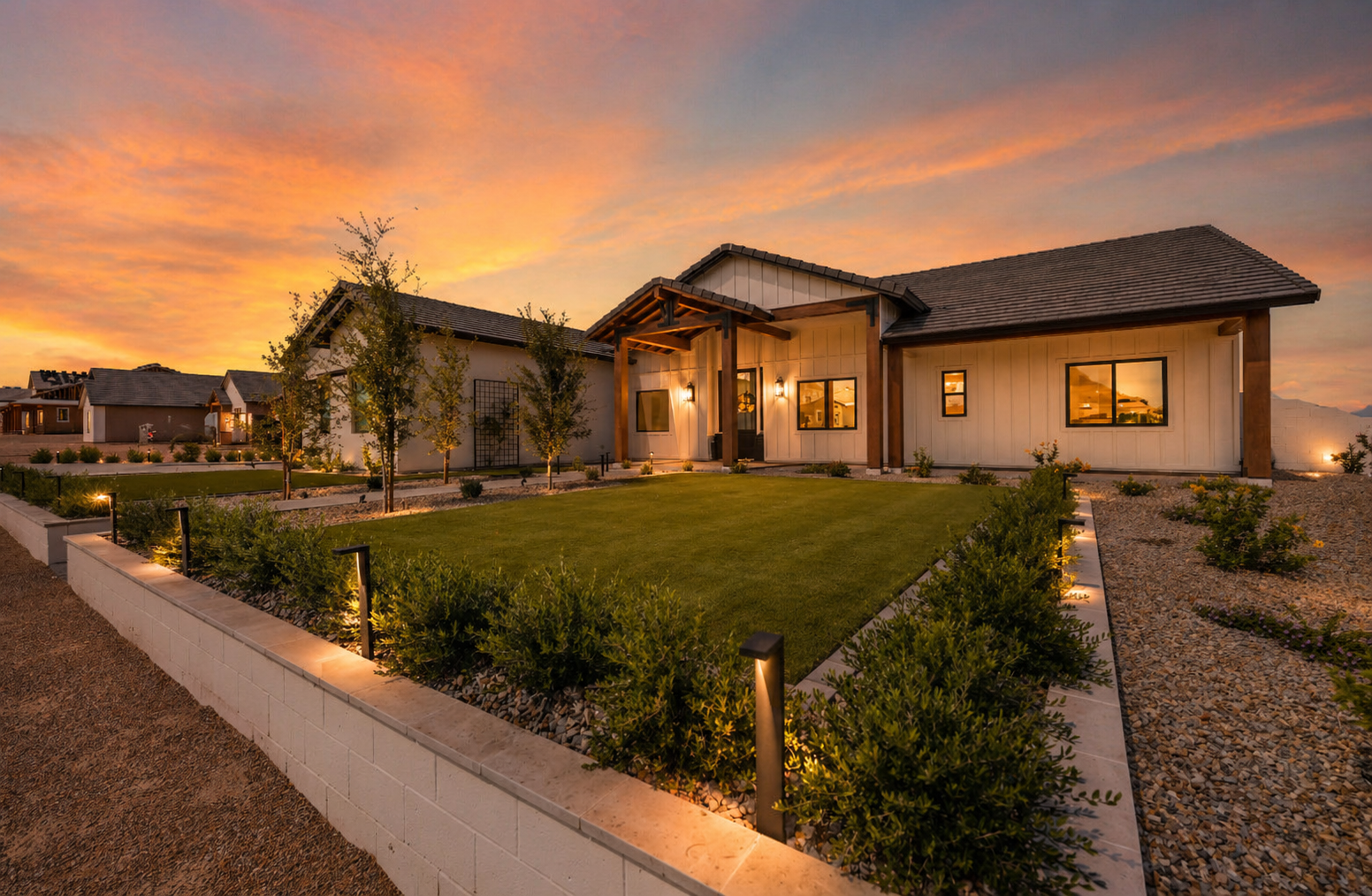 Luxury custom home in Queen Creek Arizona with modern exterior and sunset lighting